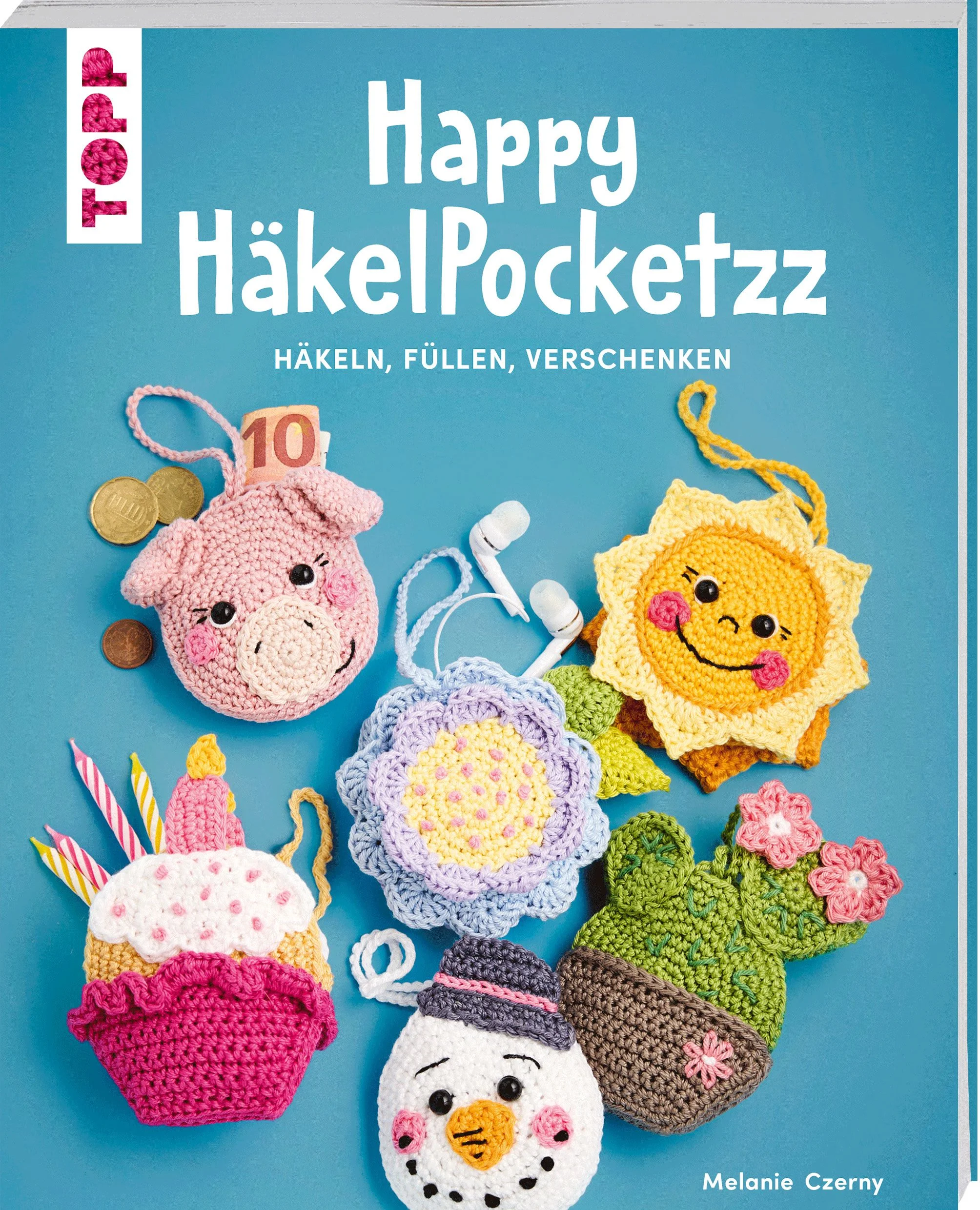 Niedliche kleine Täschchen selbst häkelnDie kleinen Pocketzz machen wirklich happy! Sie sind super schnell und mit wenig Materialaufwand gehäkelt. Die Täschchen sind süße Begleiter in allen Lebenslagen, sie sind praktisch und eignen sich perfekt als Geschenk. Einfach mit einer Kleinigkeit oder einem Gutschein befüllen und schon ist ein liebevolle Überraschung fertig. Die Happy HäkelPocketzz sind aber auch perfekt, um Schmuck, Haargummis, deine Lippenpflege, Ladecase für Kopfhörer, Kaugummis und noch vieles mehr aufzubewahren. Hier sind deiner Fantasie keine Grenzen gesetzt. Lass dich in die bunte Welt der Pocketzz enführen und häkle dir ein, zwei, viele Täschchen!Das erwartet dich:Häkelanleitungen für Mini-Täschchenfröhliche Motive für jeden Anlassmit ausführlichem GrundlagenteilSchritt-für-Schritt-Anleitungen zu jedem Modellfür Anfänger:innen und Fortgeschrittene